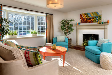 Example of a transitional dark wood floor and brown floor living room design in Boston with white walls, a standard fireplace and a brick fireplace