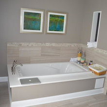 soaking tub/big surround, whites and grey/tans