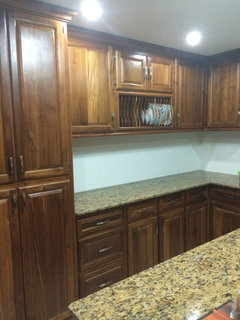 What countertop should one use with teak cupboards.