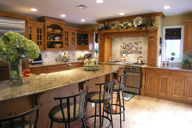 Example of a transitional kitchen design in New York