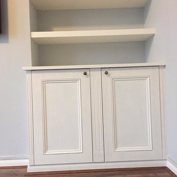 Fireplace recess cupboard and shelves