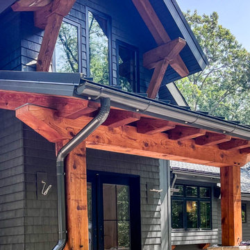 6-inch Bronze Half-Round Gutters with Leafguard and Round Downspout