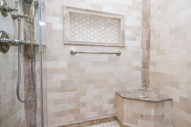 Photo of an expansive traditional master bathroom in Providence with furniture-like cabinets, white cabinets, an open shower, a two-piece toilet, white tile, porcelain tile, beige walls, porcelain floors, an undermount sink, engineered quartz benchtops, white floor and a hinged shower door.