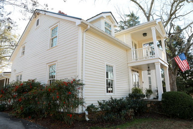 Example of a country exterior home design in Atlanta