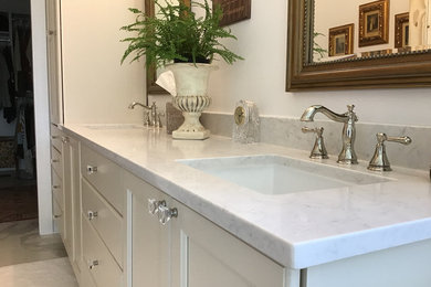 Bathroom - mid-sized farmhouse master bathroom idea in Other with flat-panel cabinets, white cabinets, quartz countertops and white countertops