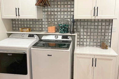 Example of a laundry room design in Other
