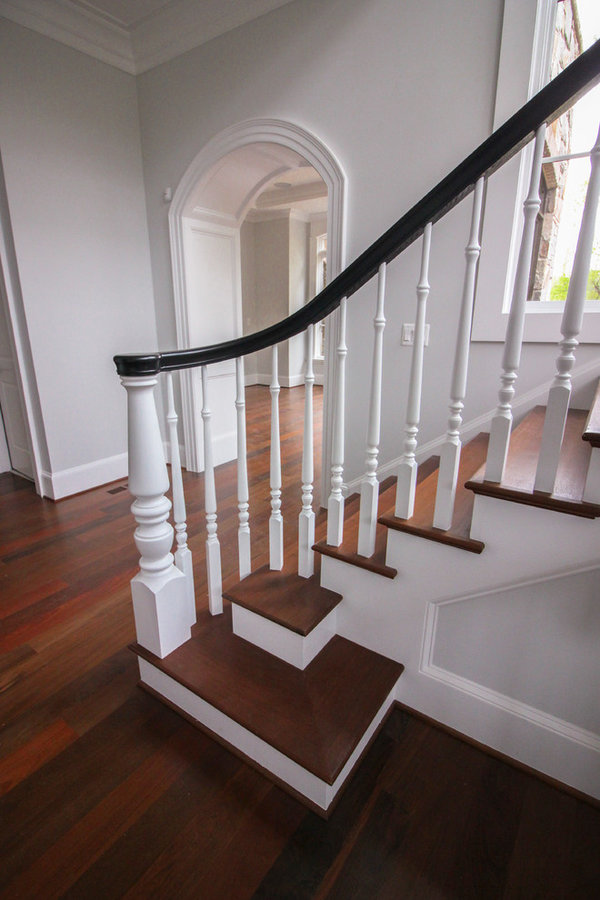 Powerful Impression by Floating Staircase in Suburban Foyer