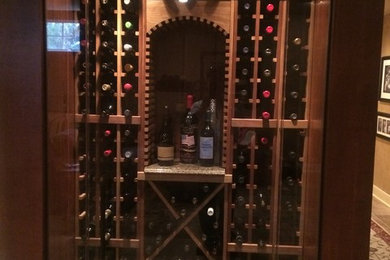 Wine cellar - rustic wine cellar idea in Indianapolis