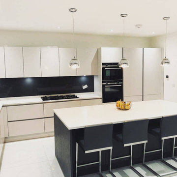 Ultra Modern Kitchen with LED lights in North Harrow By Kudos Interior Designs