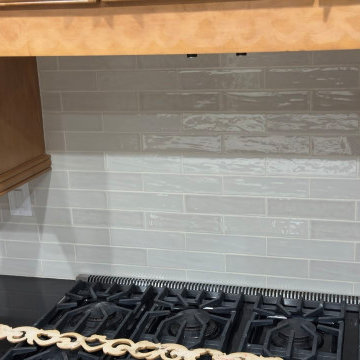 Classic Wood Kitchen with Modern Glass Backsplash