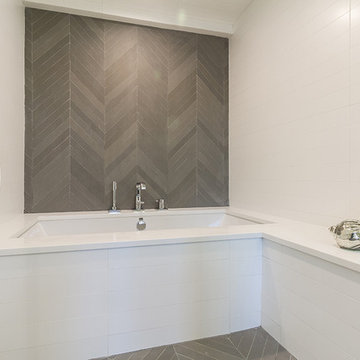 Deep soaking tub and glass-enclosed shower