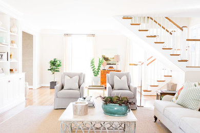 Elegant medium tone wood floor living room photo in Nashville