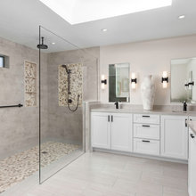 shower floor tile different from rest of bathroom