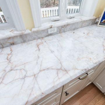 White Crystal Quartzite + Vintage Furniture + Exposed Brick