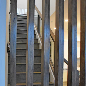 Fully Custom Staircase Rail with Vertical Ceiling Slats