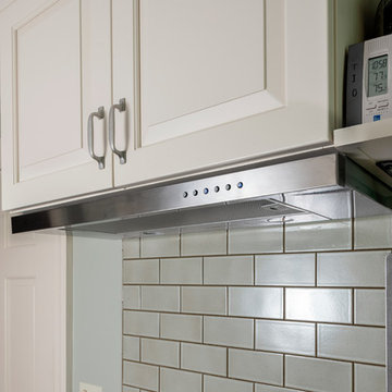 Vent slides in so tall folks don't get "a face full of stainless steel"