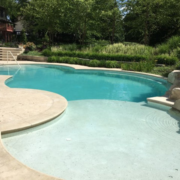 Cedar Rapids, Iowa - Custom Concrete Swimming Pool with Rock Waterfall Feature