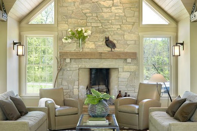 Traditional living room in St Louis with a stone fireplace surround.