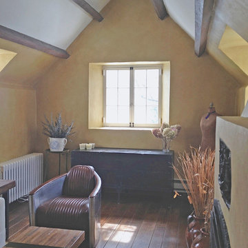 Warm color washed plaster walls.