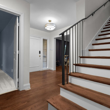 Contemporary Foyer With Hardwood Floors