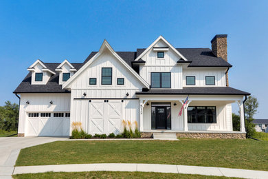 Country white two-story exterior home photo in Other