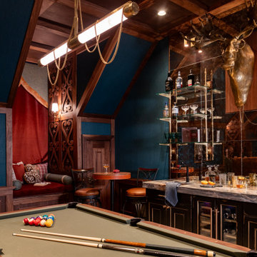 Luxury Moody Media Room with Walnut Paneling and Teal Grasscloth in Westlake, Te
