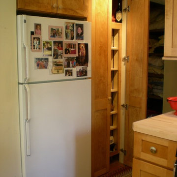 Patricia Wood kitchen. Small space-efficient, Craftsman style, stained maple.