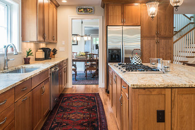 This is an example of a mid-sized arts and crafts kitchen in Denver.