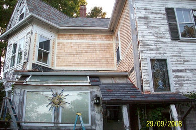 Example of a mid-century modern exterior home design in Boston