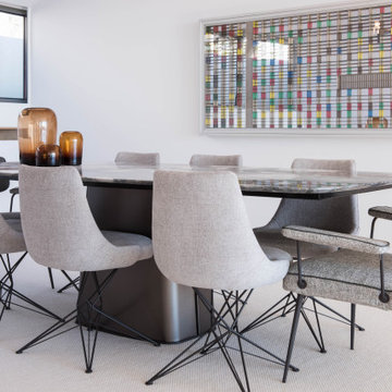 Dining Room with Marble Table and Art Panel