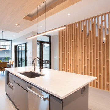 Modern Chicago Kitchen with Custom Slatted Wood Partition, Waterfall Island & Op