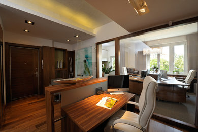 Example of a trendy home office design in Other
