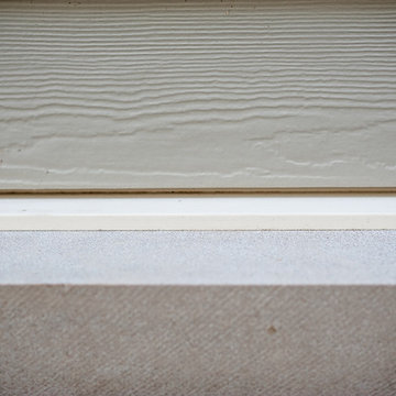 Pearl Gray James Hardie siding - 6'' exp. Cedarmill Finish.