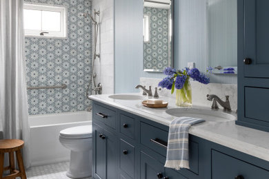 Bathroom - mid-sized traditional blue tile and marble tile marble floor, double-sink and wallpaper bathroom idea in Seattle with beaded inset cabinets, blue cabinets, a one-piece toilet, an undermount sink, quartz countertops, white countertops and a built-in vanity
