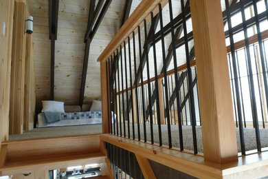 Family room - light wood floor family room idea in Boston