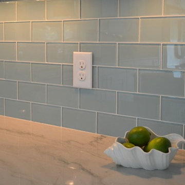 Kitchen Remodel with White Copenhagen Cabinetry and White Macauba Quartzite Tops