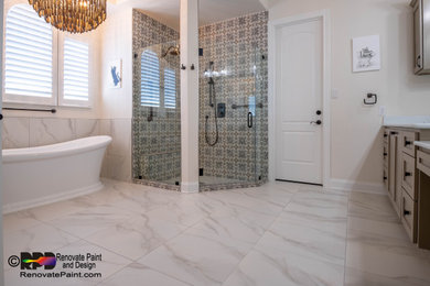 Example of a trendy master white tile and ceramic tile porcelain tile, white floor, double-sink and vaulted ceiling bathroom design in Austin with shaker cabinets, beige cabinets, a one-piece toilet, beige walls, an undermount sink, quartzite countertops, a hinged shower door, white countertops, a niche and a built-in vanity
