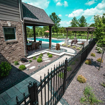 Versatile Outdoor Escape: Turf, Patio, Pergolas & Water Features