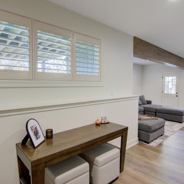 Warm & Inviting Basement Retreat with Kitchenette and Reading Nook