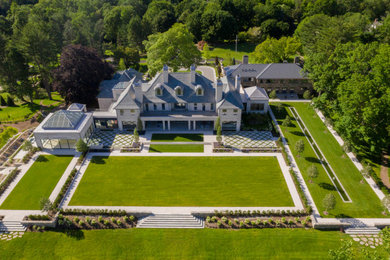 Inspiration for a huge house exterior remodel in New York