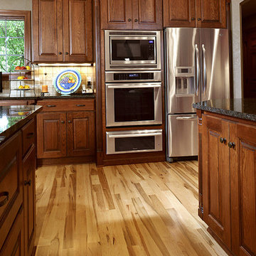 Door style: Covington W | Species: Cherry | Finish: Autumn with Walnut glaze