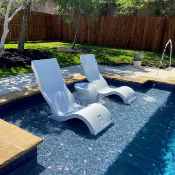 Backyard Paradise Geometric Pool and Flush Spa