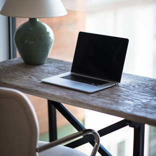 Inspiration for a medium sized modern study in Los Angeles with white walls, marble flooring, no fireplace and a freestanding desk.