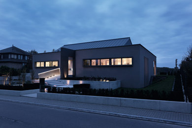 Modern exterior home idea in Other