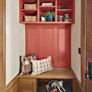 Photo of a small eclectic vestibule in Minneapolis with beige walls and slate floors.