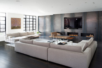 Mid-sized contemporary living room in DC Metro with a built-in media wall.