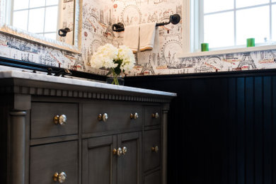 Inspiration for a small mediterranean black tile porcelain tile, white floor and wallpaper powder room remodel in Other with furniture-like cabinets, gray cabinets, black walls, an undermount sink, marble countertops, white countertops and a freestanding vanity