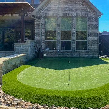 The Ultimate Golfer’s Retreat: Custom Putting Green & Entertainment Oasis