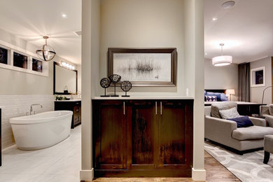 Bedroom - huge contemporary master medium tone wood floor bedroom idea in Calgary with white walls