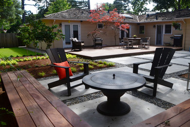 Photo of a mid-sized contemporary backyard shaded garden in San Francisco with concrete pavers.